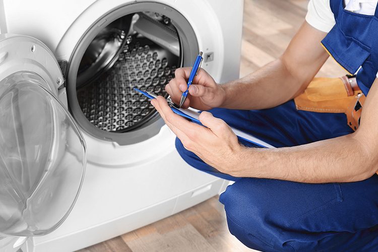 "Expert technician repairing LG appliances at the LG service center in Sharjah."